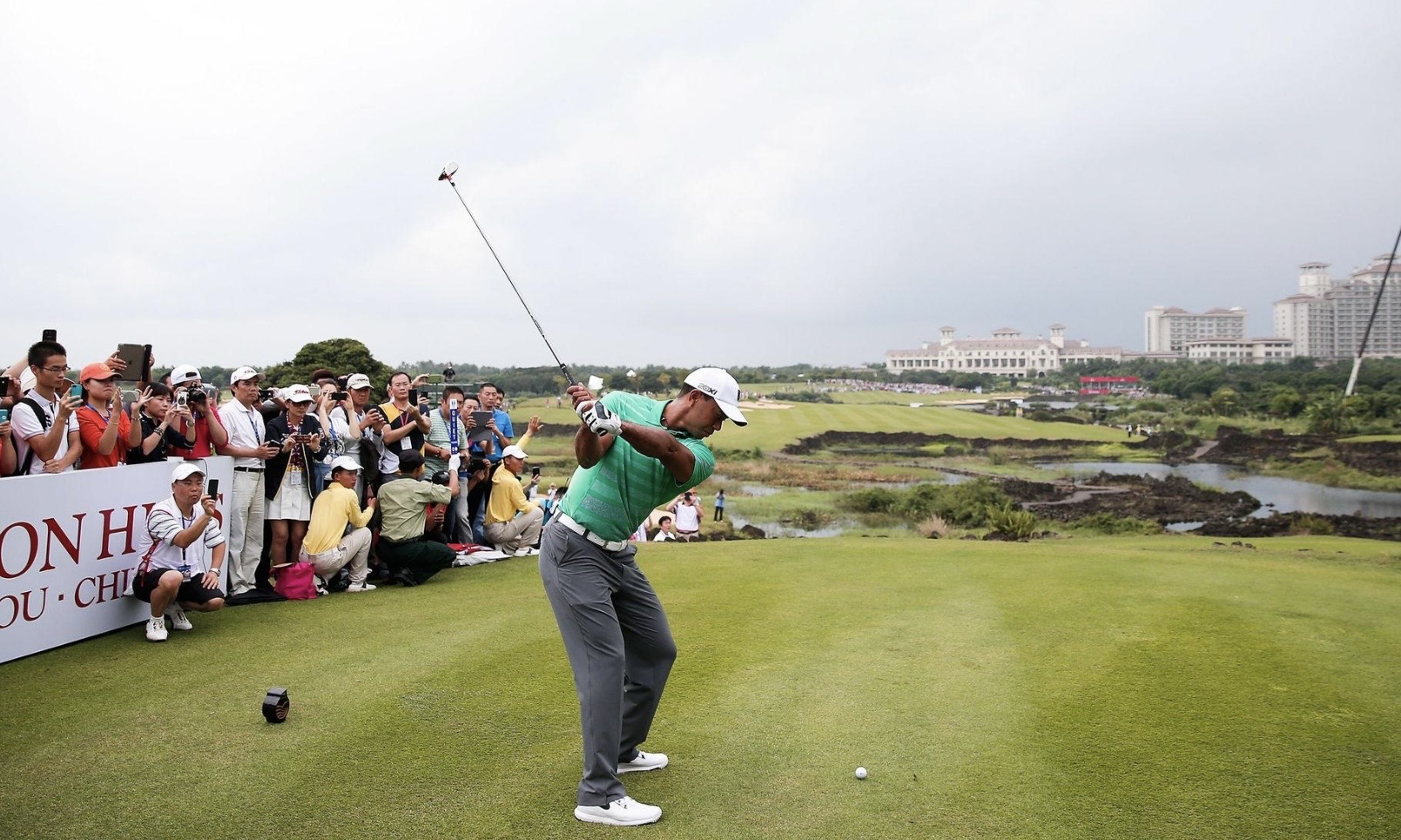 Tiger Woods teeing off at Mission Hills Haikou