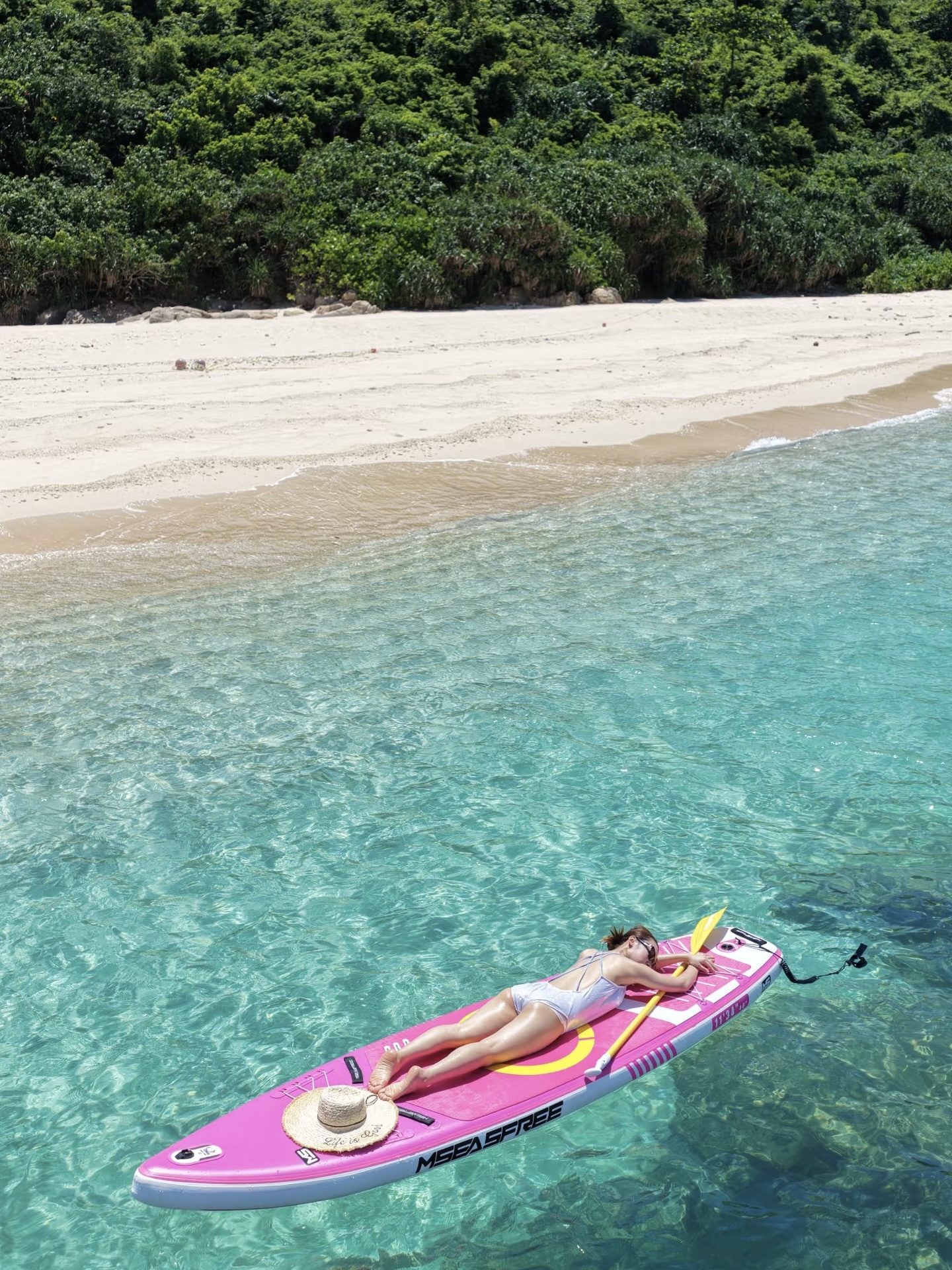 Paddleboarding on crystal-clear water